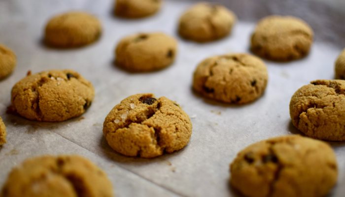 almond flour chocolate chip cookies on a baking sheet