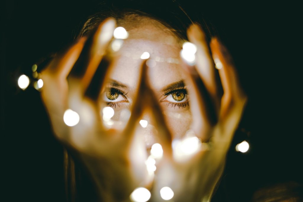 woman with magic lights