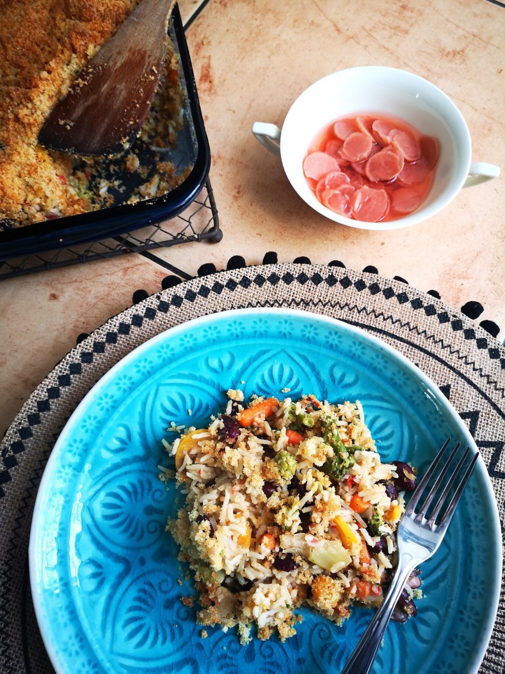 leftover casserole on a blue plate