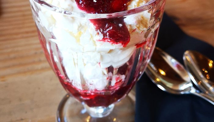 vegan eton mess in a glass dish on a table