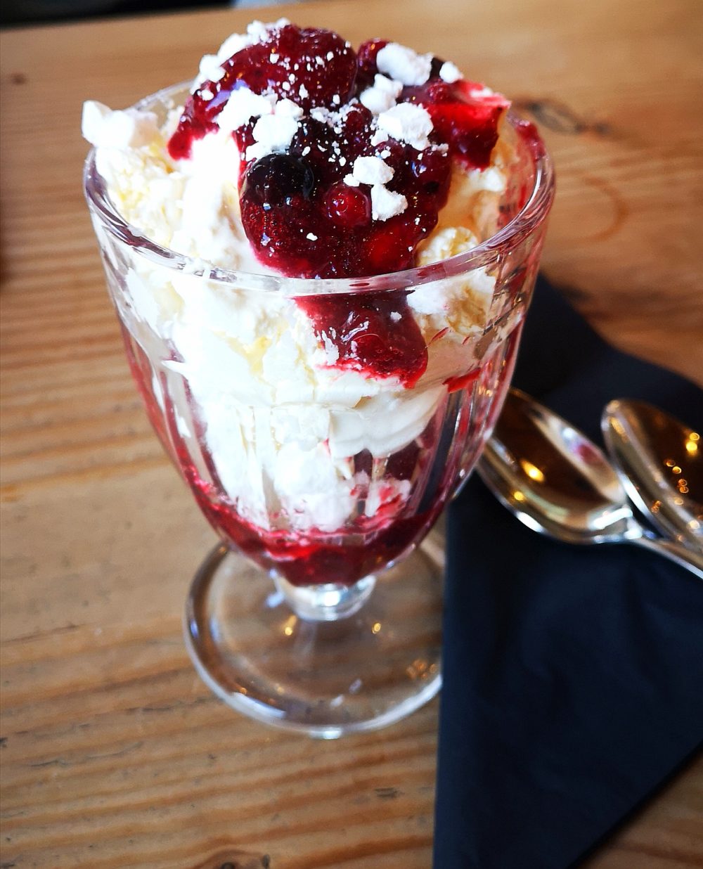 vegan eton mess in a glass dish on a table