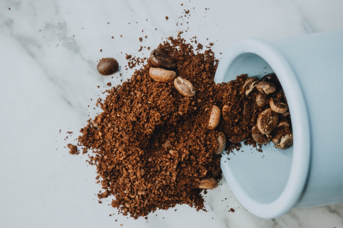 Is it safe to dispose of coffee grounds down the sink?