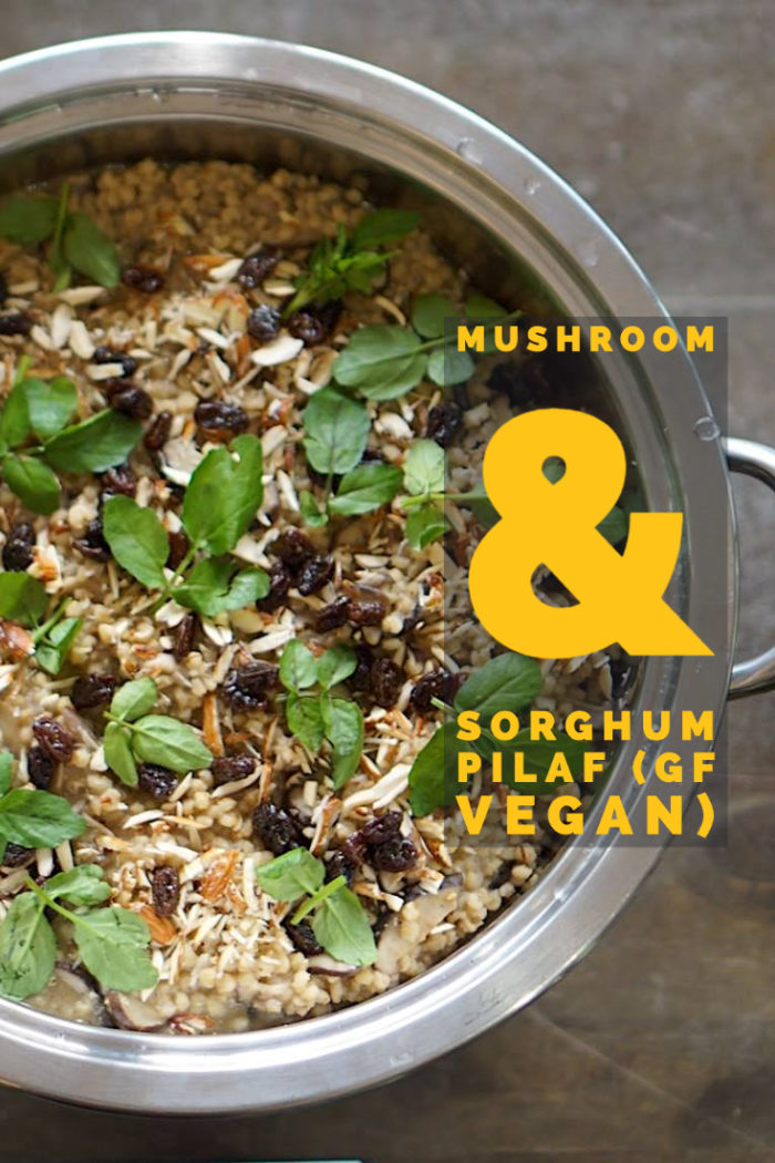 mushroom sorghum pilaf in a rilver pot on a table with caption