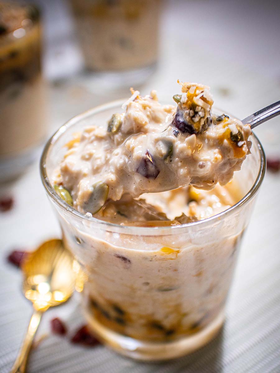 passionfruit overnight oats in a clear glass