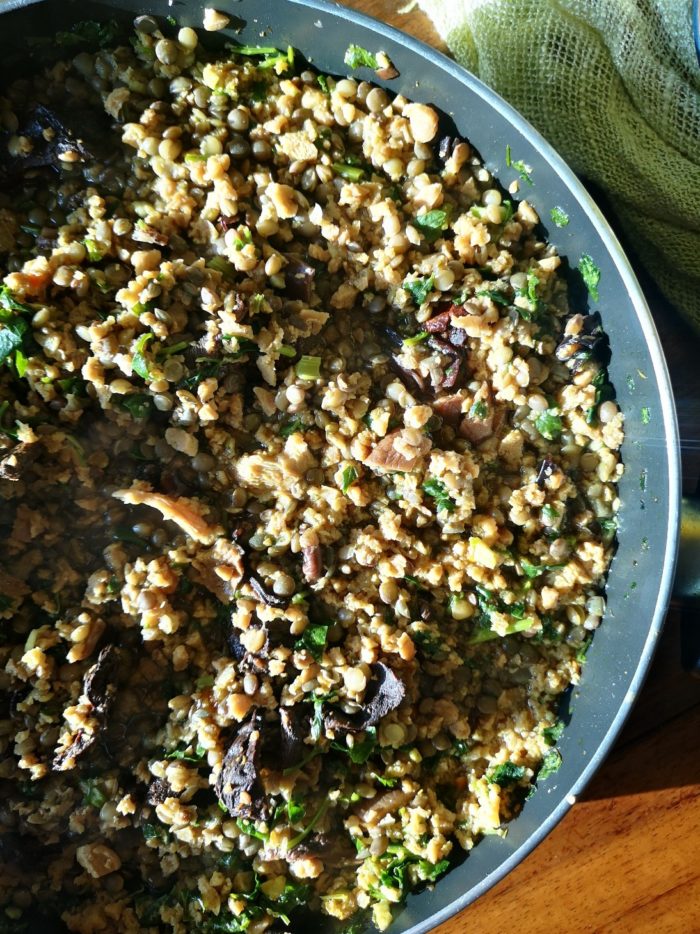 green lentil wild mushroom stew in a pot