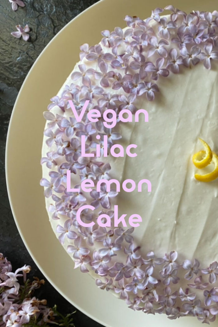 vegan lilac lemon cake on a white plate with caption