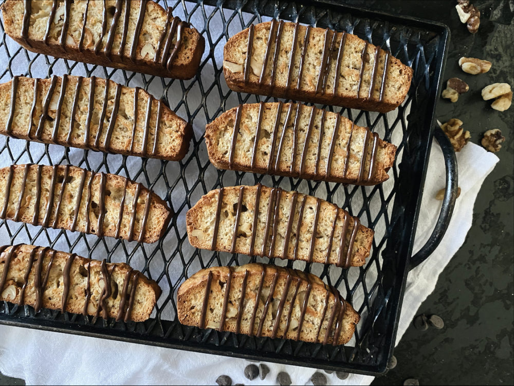 vegan banana bread biscotti on a cooling rack