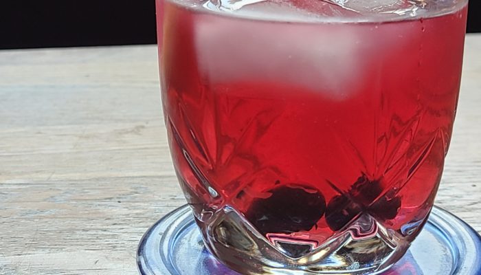 lemon blueberry iced tea in a glass