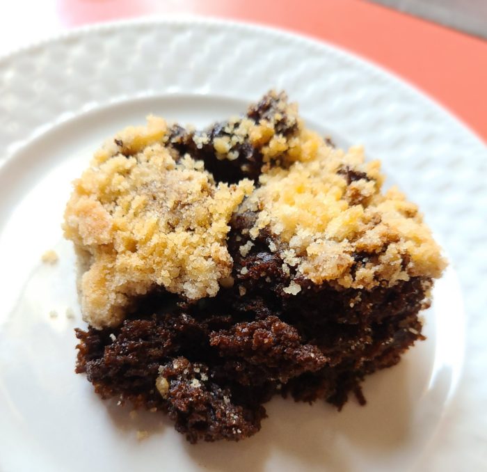 vegan molasses cake on a white plate