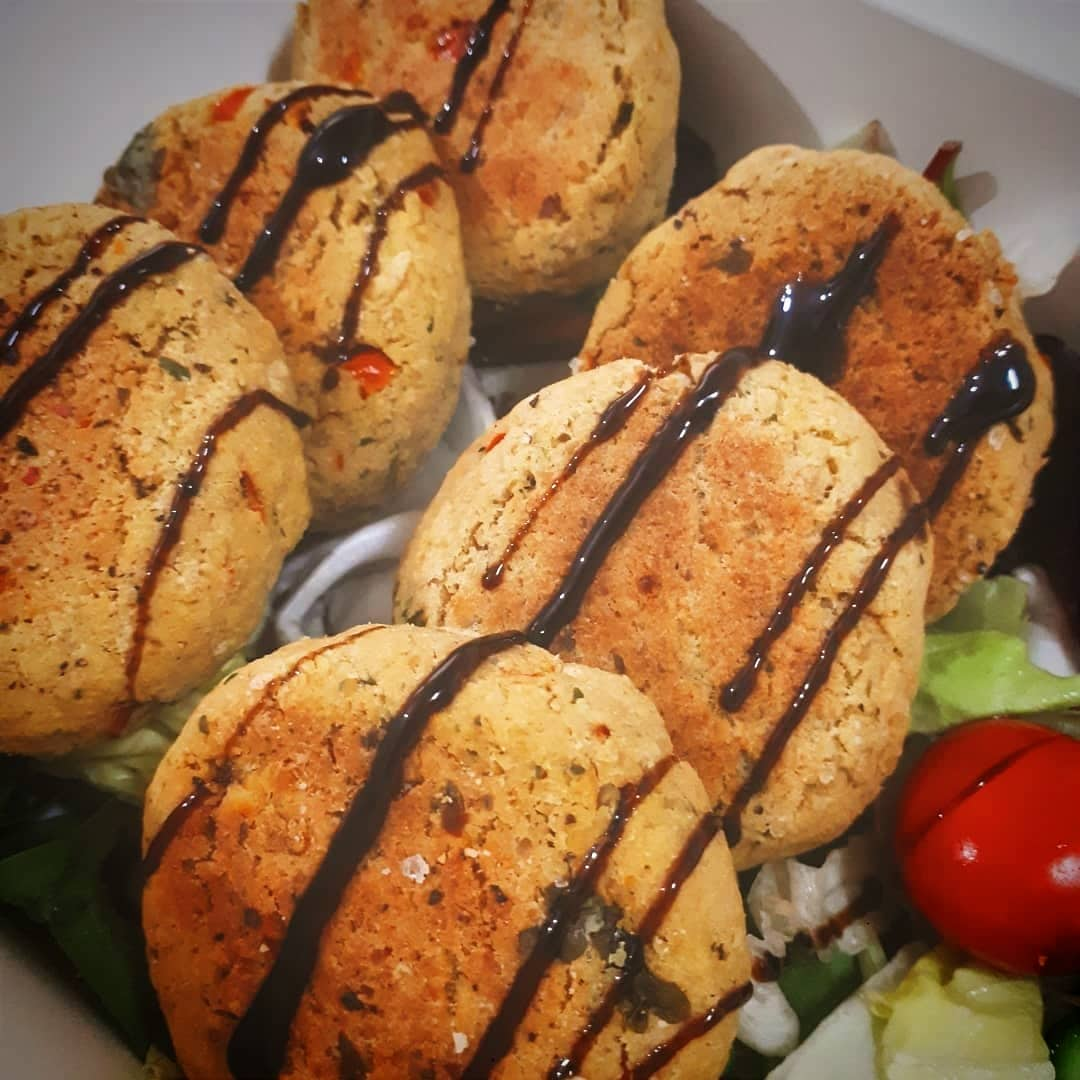 Lemon & Coriander Patties with a white background