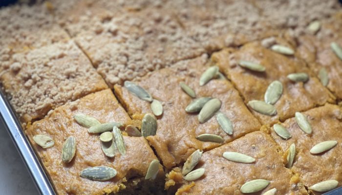 pumpkin tray cake cut into squares