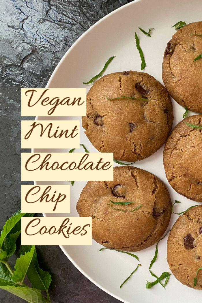 vegan mint chocolate chip cookies on a white plate with caption