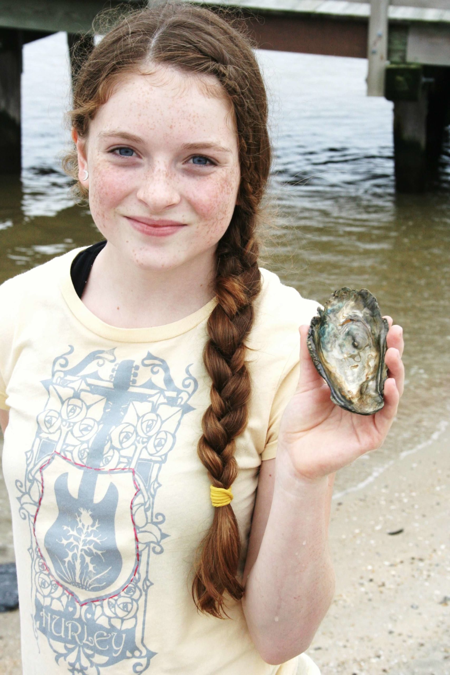 Em with an oyster shell