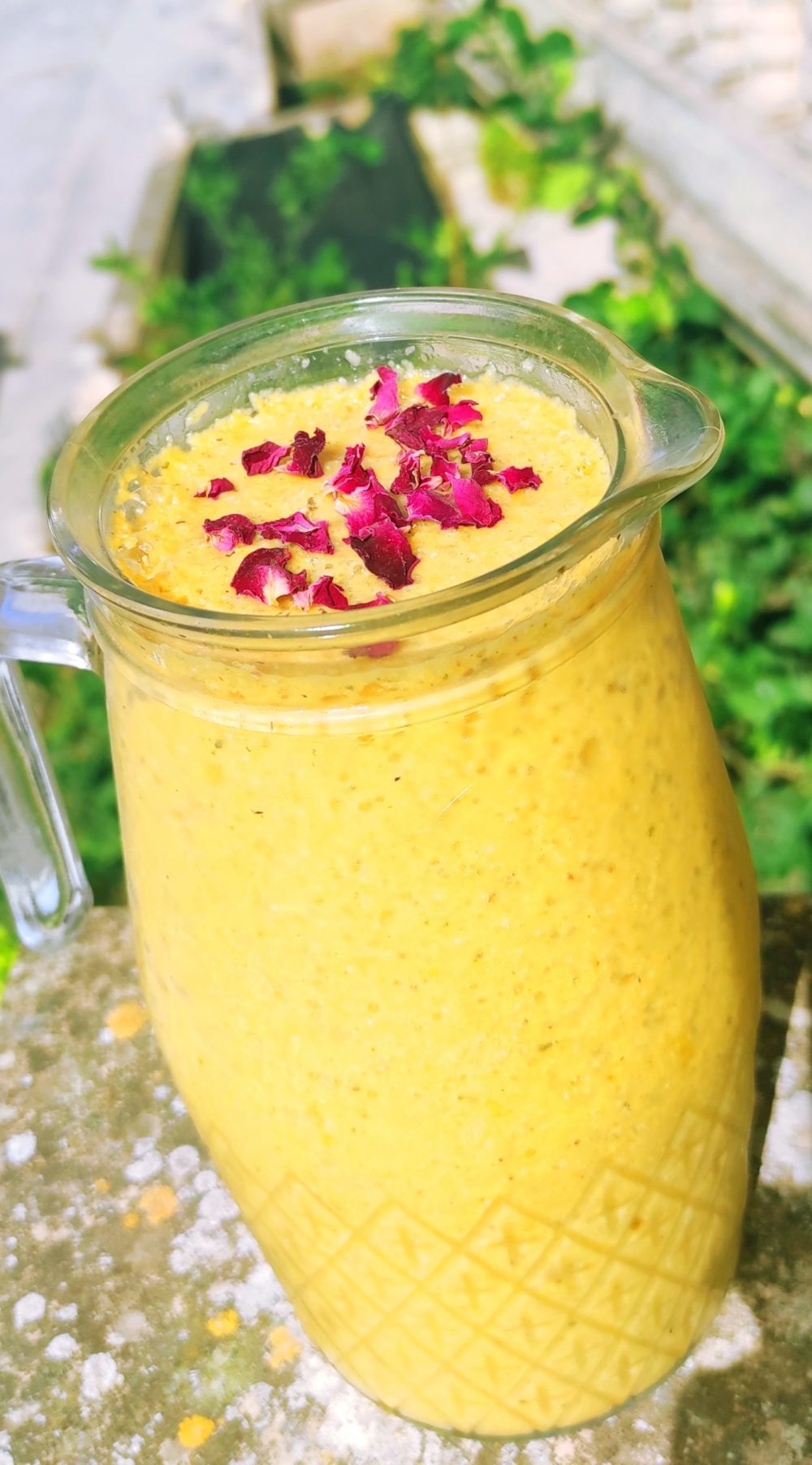 yellow sleep elixir smoothie in a glass mug