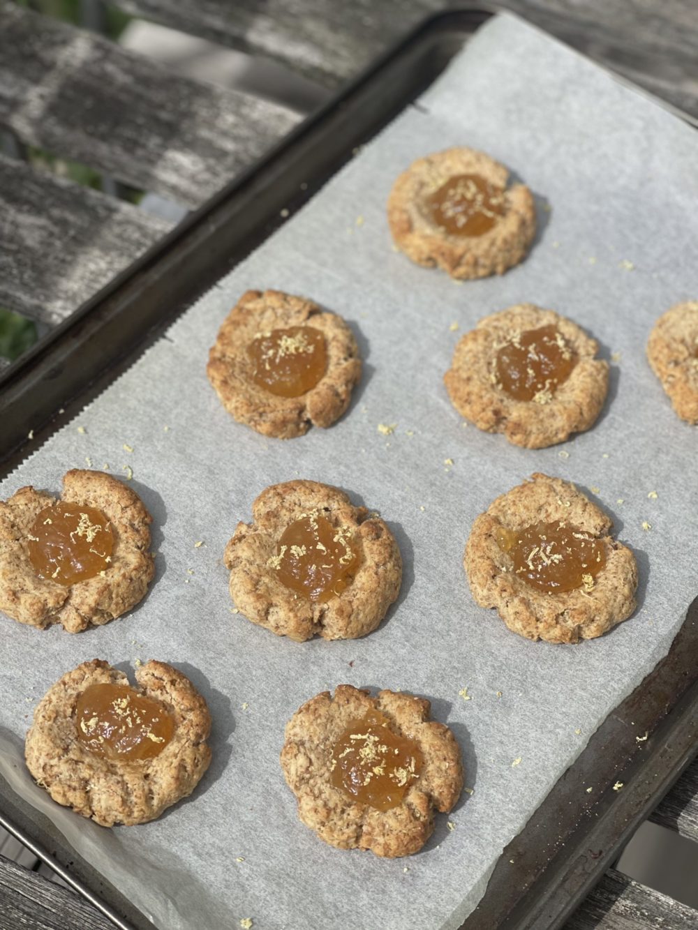 citrus thumbprint cookies on a baking sheet