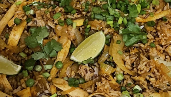 vegan biryani in a dark pan