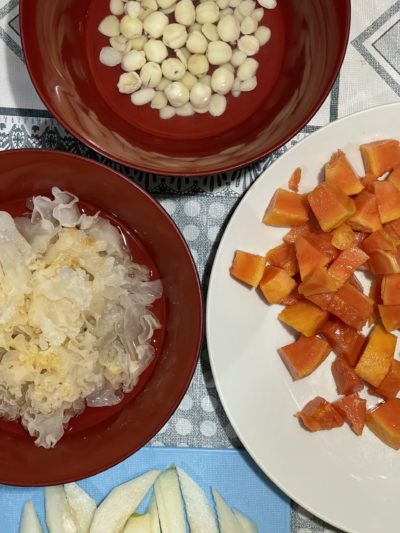 ingredients for soup on four plates