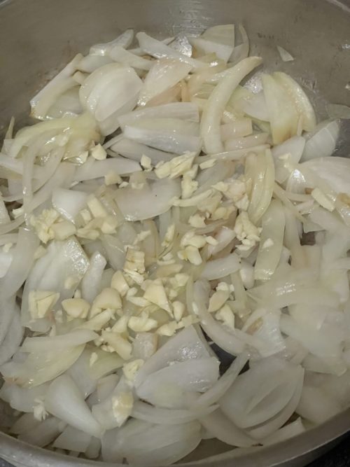 garlic and onions in a silver bowl