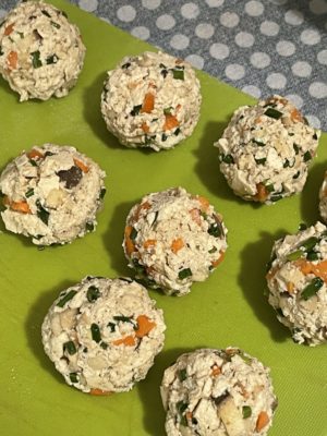 vegan meatballs on a green background