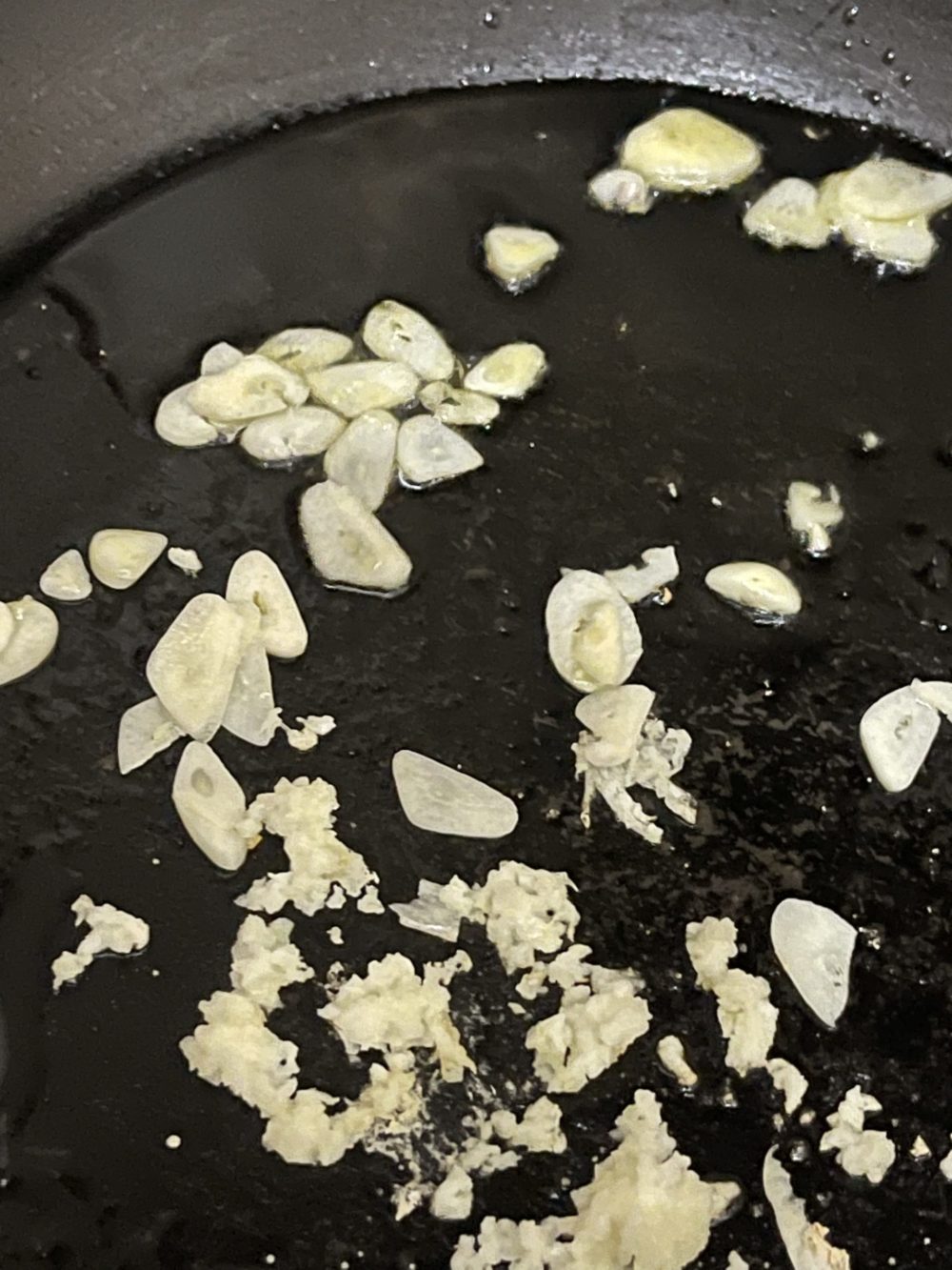 Garlic in a pan with oil