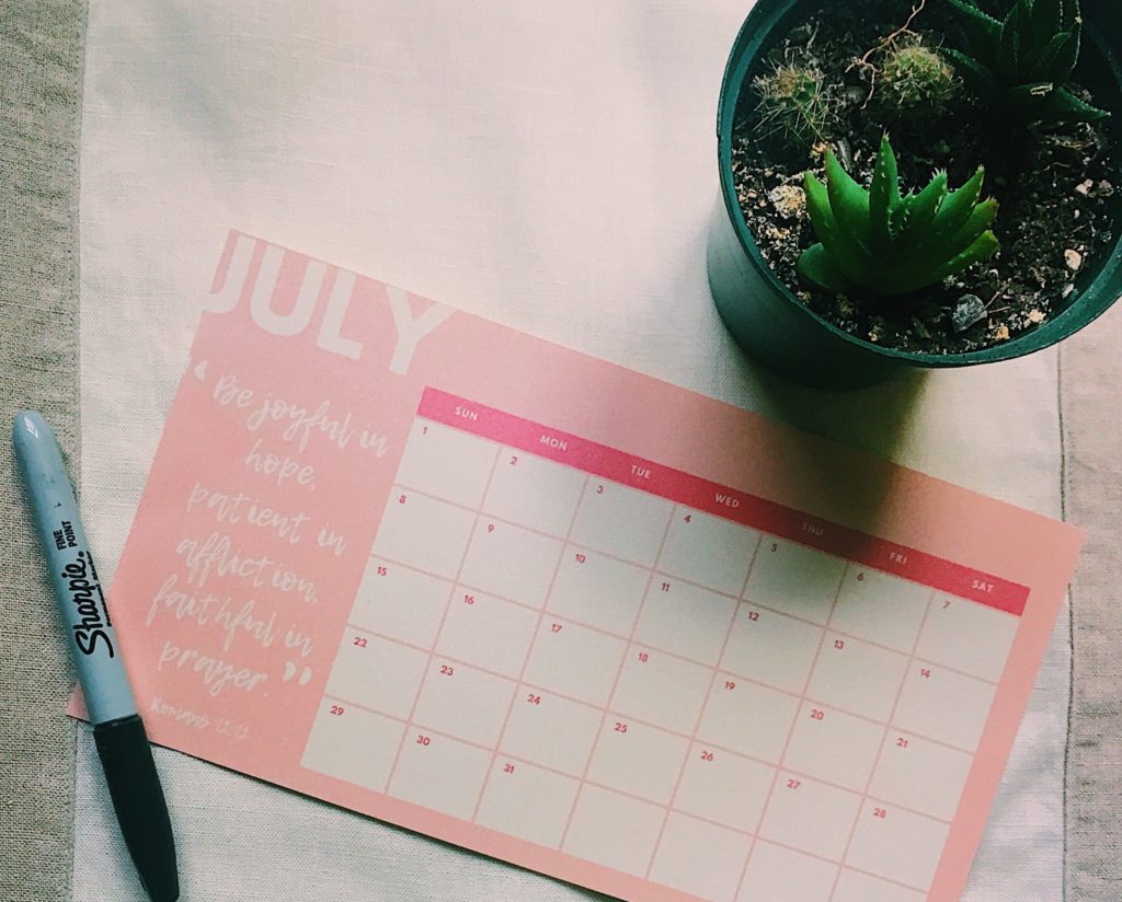 calendar that says "July" next to plant