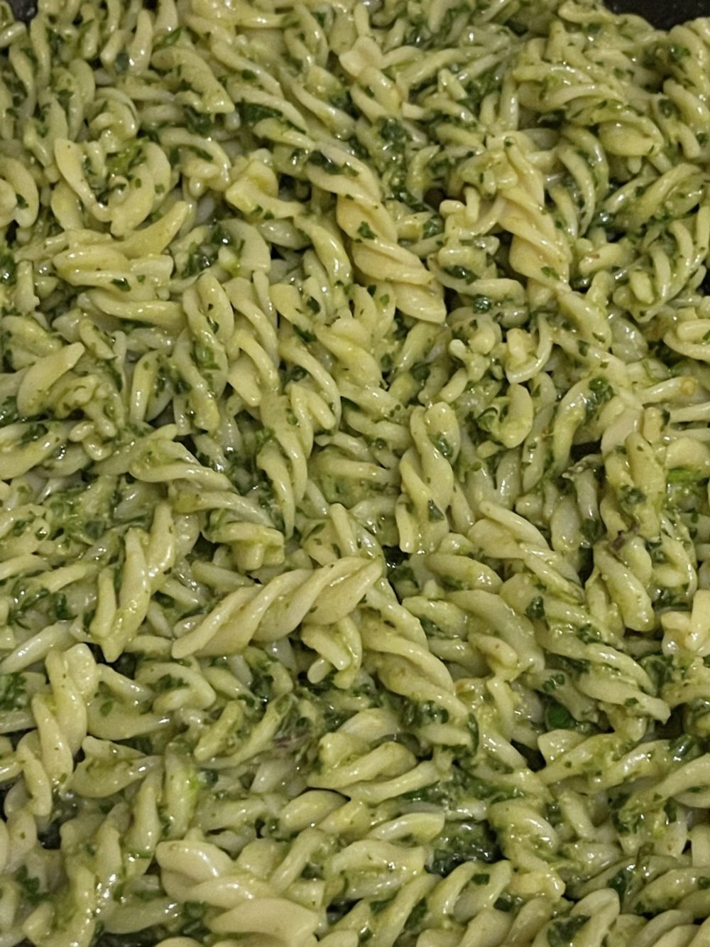 Spiral pasta with green pesto