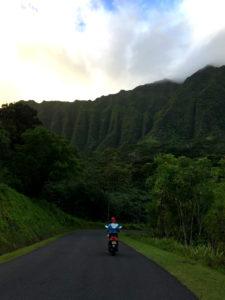 Riding moped at an Oahu botanical garden, experiencing the positive benefits of ketamine treatment.