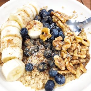Oat_blueberries_bananas_nuts_porridge_bowl