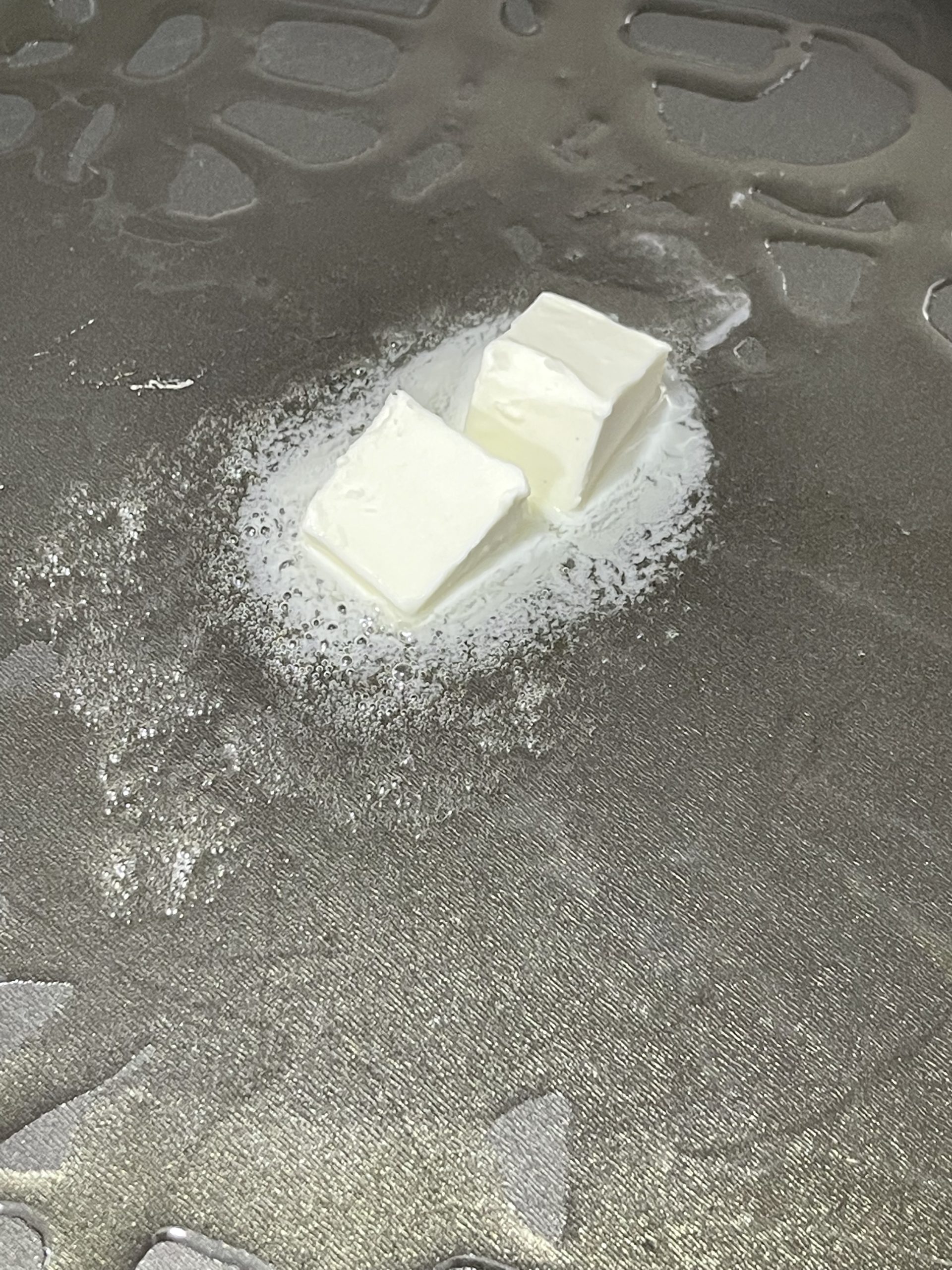 vegan butter melting in a pan