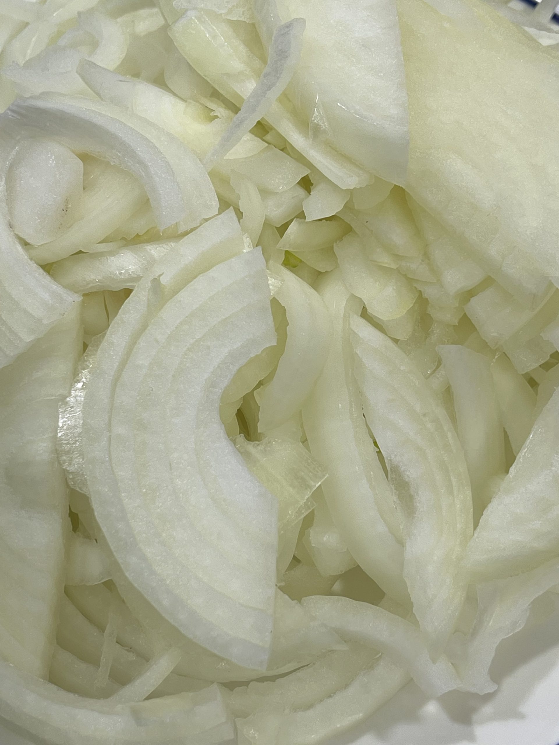 close up of raw sliced onions