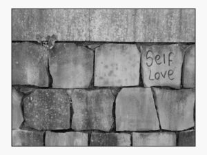 Wall with bricks and self love
