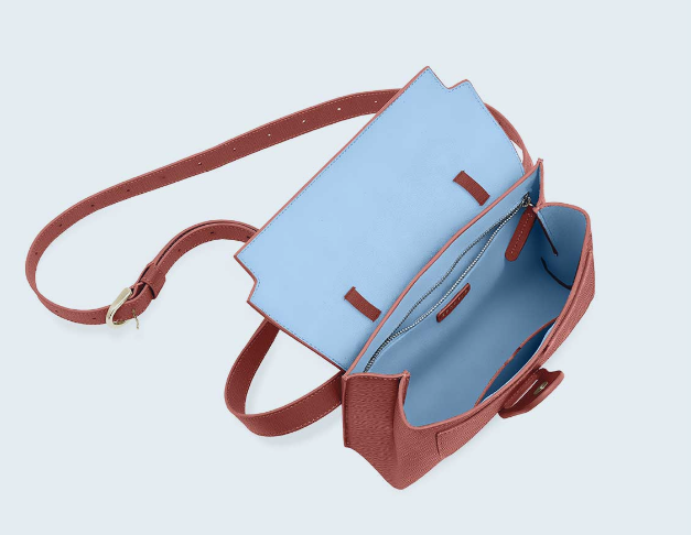 Vegan Aria Belt Bag by Senreve against a white background