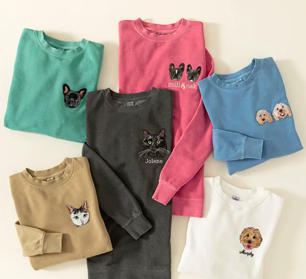 sweatshirts in multiple colors with dog or cat faces embroidered on the  chest.