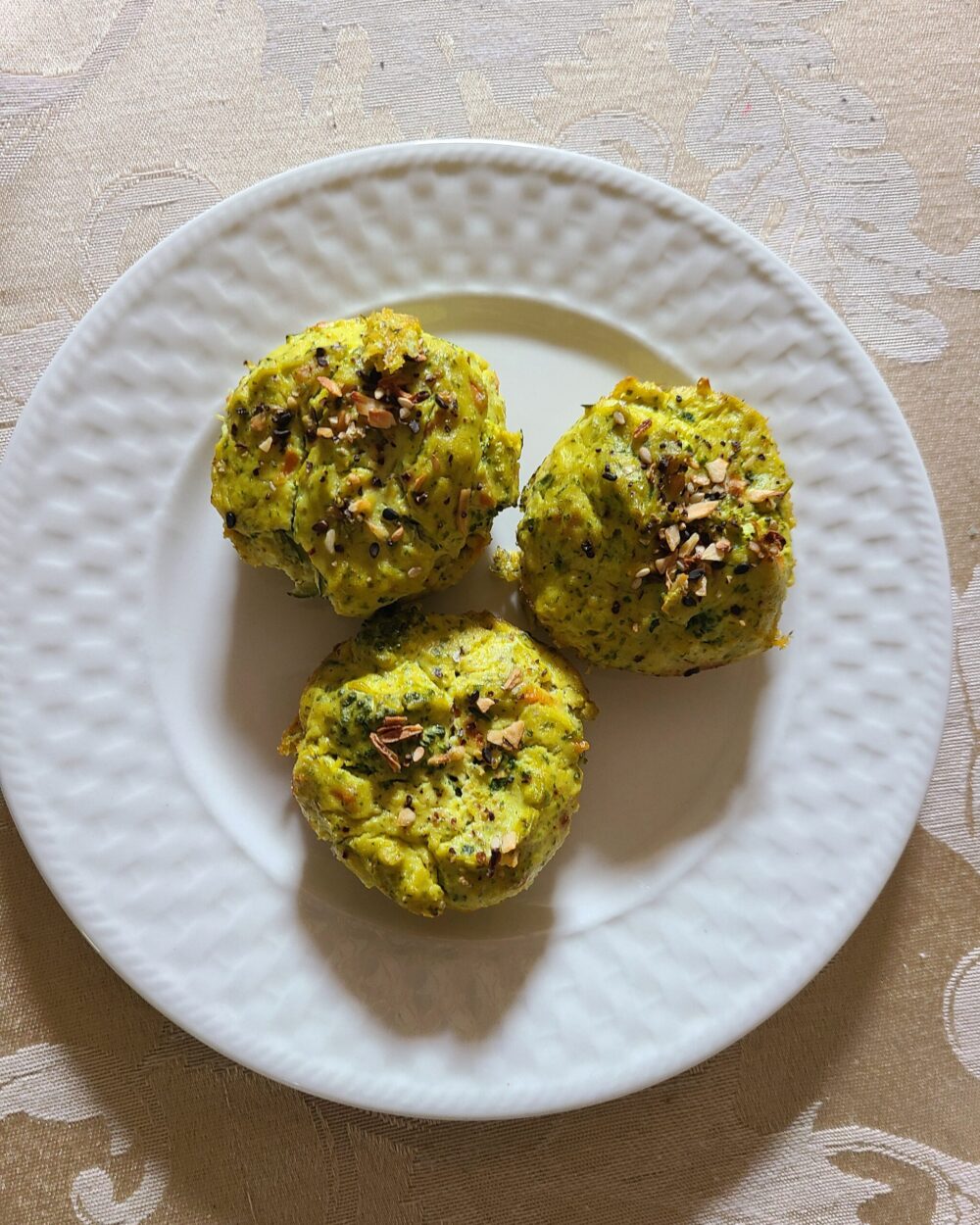 three super-green veggie bites on a white plate