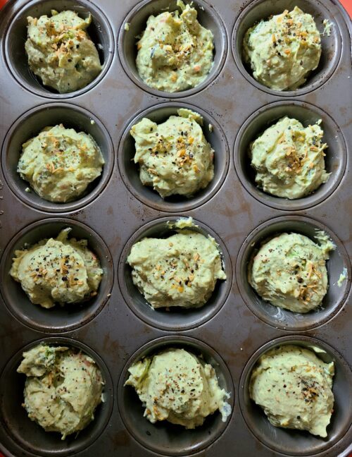 a muffin tin of unbaked tofu veggie bites